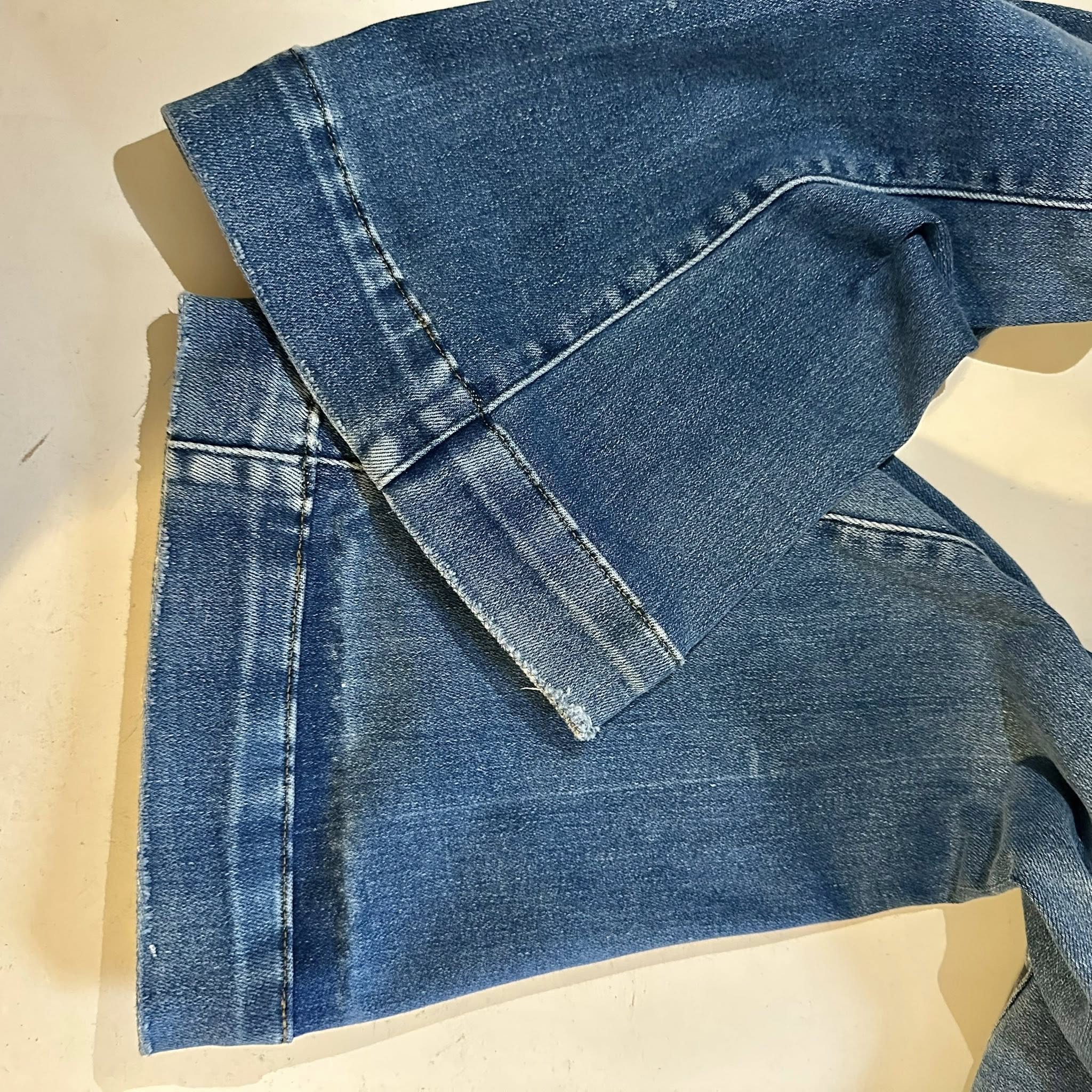 Damaged jeans — after repair